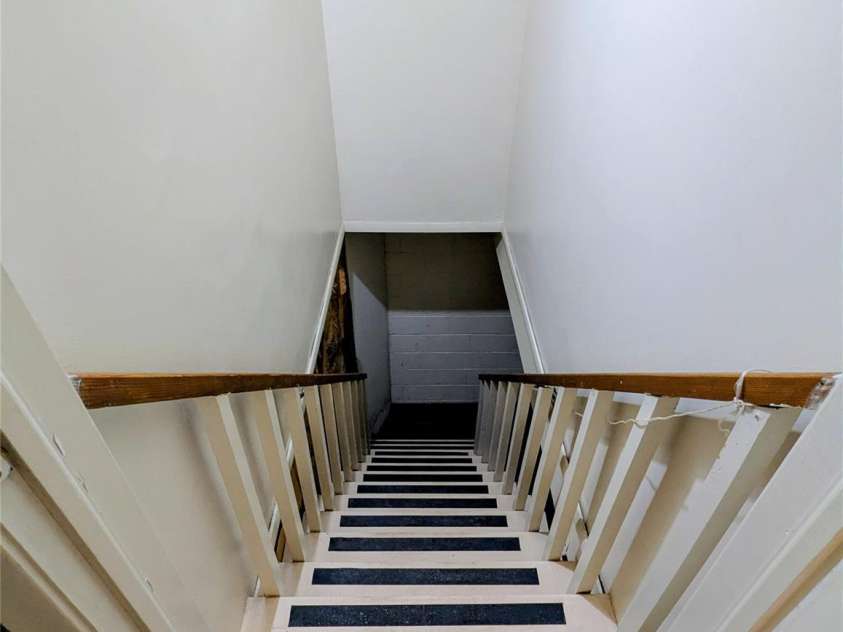 505 Richards Drive, Shelby, NC 28150.  MLS# CAR4287142, YatesRealty ID 32211. Stairway to the basement