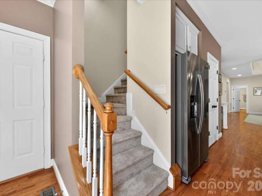 12532 Overlook Mountain Drive, Charlotte, NC 28216.  MLS# CAR4369521, YatesRealty ID 32214. Back Staircase