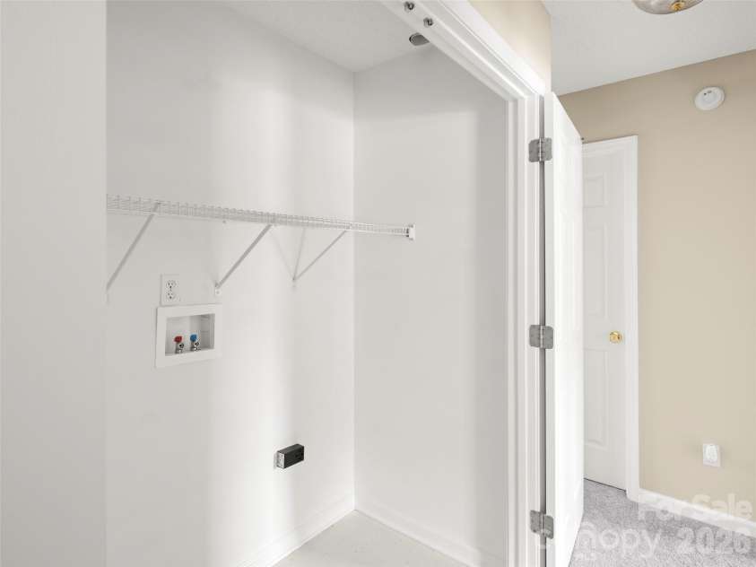 439 Glensprings Drive, Fletcher, NC 28732.  MLS# CAR4393124, YatesRealty ID 32215. Laundry closet in hall way/2nd laundry hookup in garage