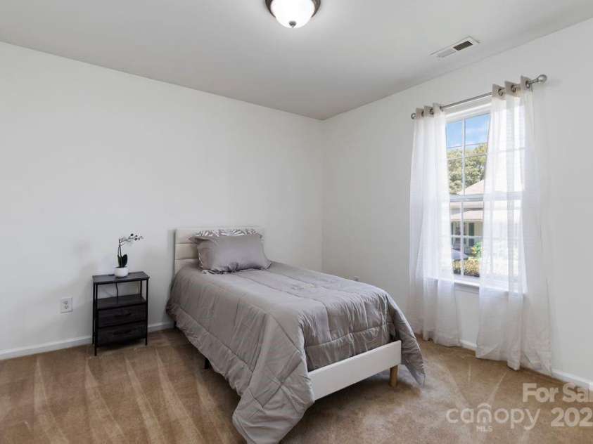608 Carr Street, Monroe, NC 28110.  MLS# CAR4284361, YatesRealty ID 32219. 2nd Bedroom