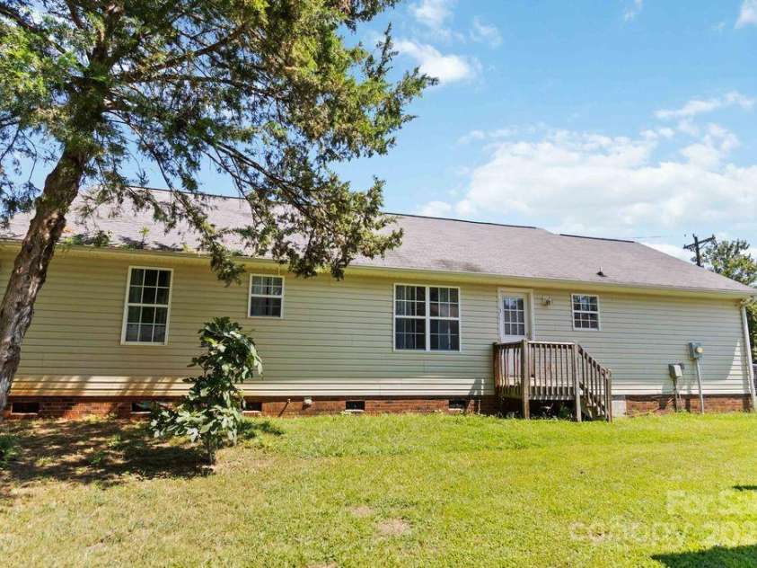 608 Carr Street, Monroe, NC 28110.  MLS# CAR4284361, YatesRealty ID 32219. Back View