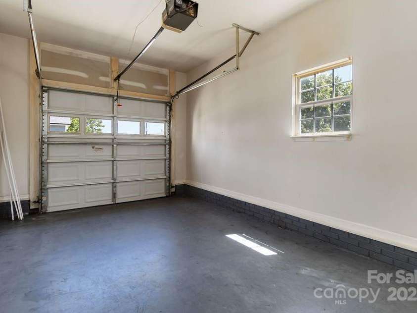 608 Carr Street, Monroe, NC 28110.  MLS# CAR4284361, YatesRealty ID 32219. Garage