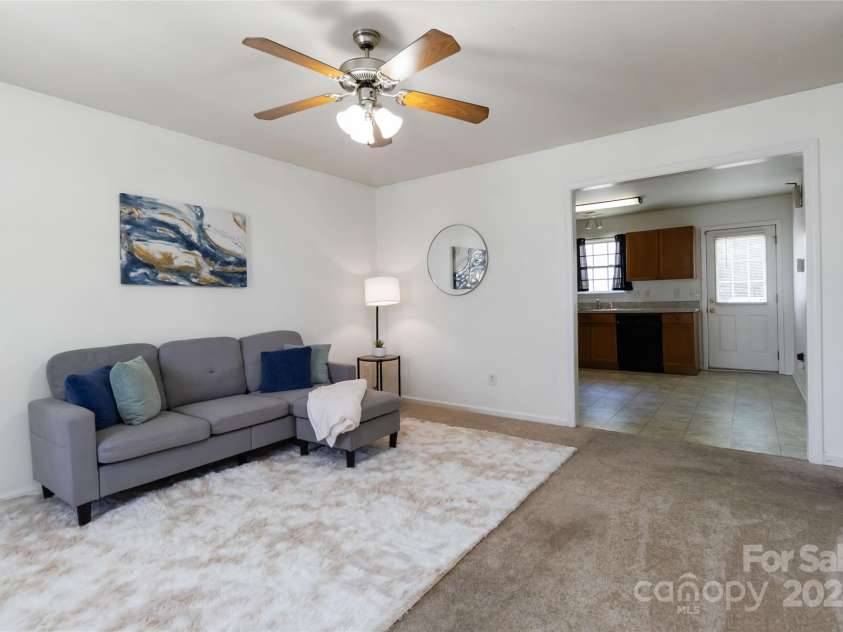 608 Carr Street, Monroe, NC 28110.  MLS# CAR4284361, YatesRealty ID 32219. Living Room