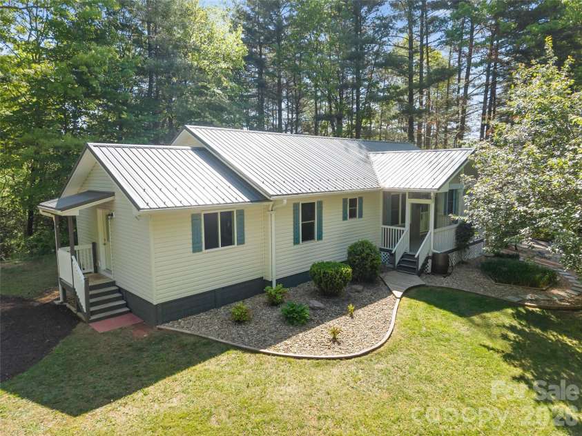 387 Crystal Creek Drive, Pisgah Forest, NC 28768.  MLS# CAR4373550, YatesRealty ID 32225. 