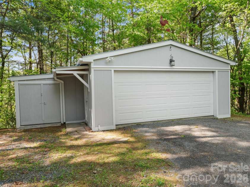 387 Crystal Creek Drive, Pisgah Forest, NC 28768.  MLS# CAR4373550, YatesRealty ID 32225. Detached garage
