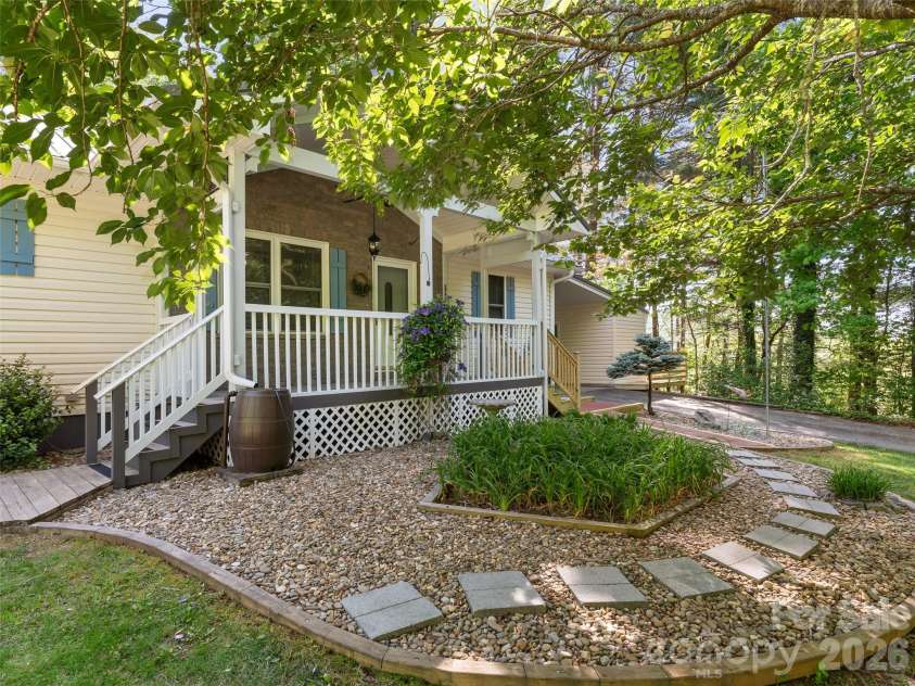 387 Crystal Creek Drive, Pisgah Forest, NC 28768.  MLS# CAR4373550, YatesRealty ID 32225. Front porch
