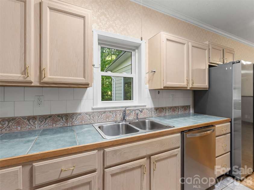 387 Crystal Creek Drive, Pisgah Forest, NC 28768.  MLS# CAR4373550, YatesRealty ID 32225. Kitchen