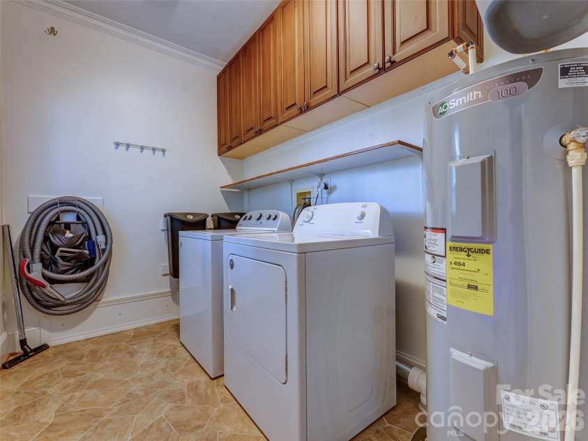 387 Crystal Creek Drive, Pisgah Forest, NC 28768.  MLS# CAR4373550, YatesRealty ID 32225. Laundry Room