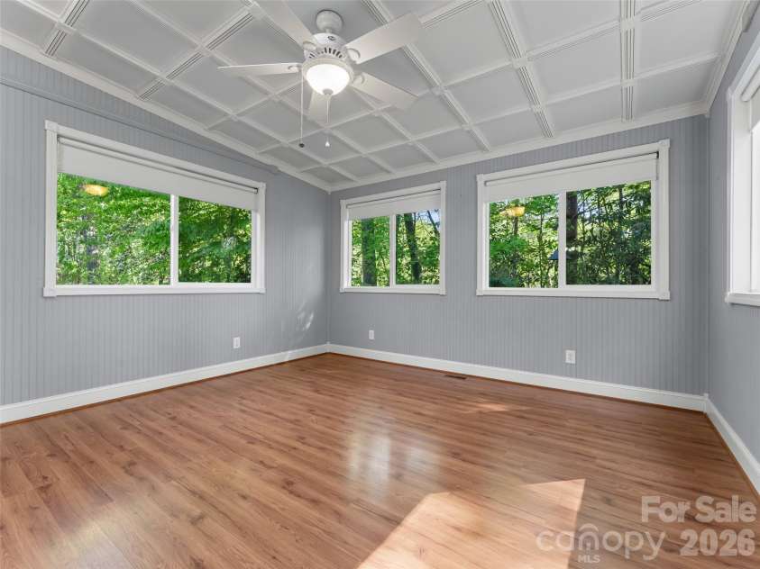 387 Crystal Creek Drive, Pisgah Forest, NC 28768.  MLS# CAR4373550, YatesRealty ID 32225. Sun room