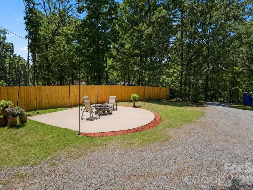 408 Birmingham Lane, Monroe, NC 28110.  MLS# CAR4394323, YatesRealty ID 32226. Entertaining/Fire pit area