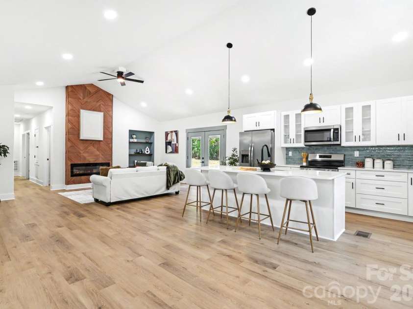 408 Birmingham Lane, Monroe, NC 28110.  MLS# CAR4394323, YatesRealty ID 32226. Living area and kitchen