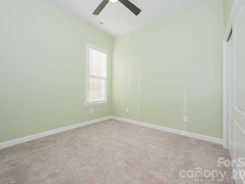 456 Lucky Drive, Concord, NC 28027.  MLS# CAR4313263, YatesRealty ID 32227. Spacious secondary bedroom #2.
