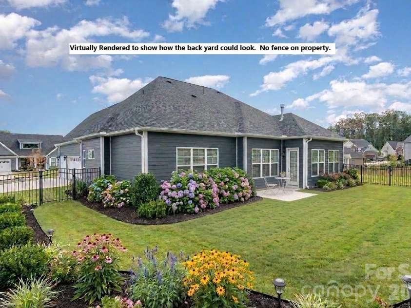 456 Lucky Drive, Concord, NC 28027.  MLS# CAR4313263, YatesRealty ID 32227. Virtually staged rear yard.