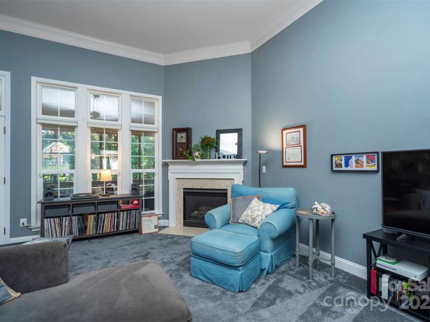 126 Doyle Farm Lane, Mooresville, NC 28115.  MLS# CAR4270254, YatesRealty ID 32228. Great Room with high ceilings, corner gas fireplace and new plush carpeting.
