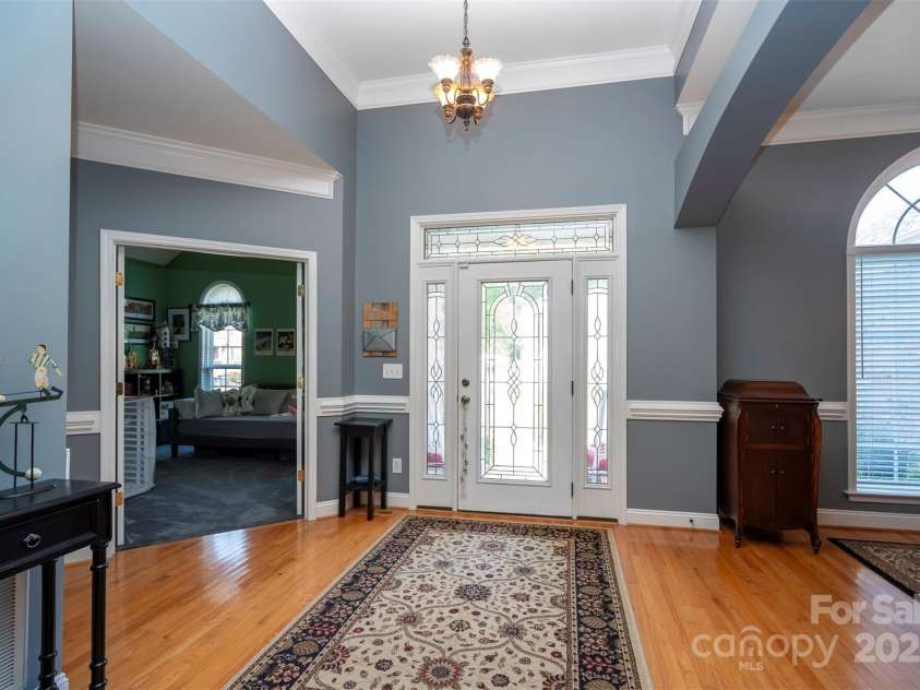 126 Doyle Farm Lane, Mooresville, NC 28115.  MLS# CAR4270254, YatesRealty ID 32228. Open floorplan beginning with the foyer.