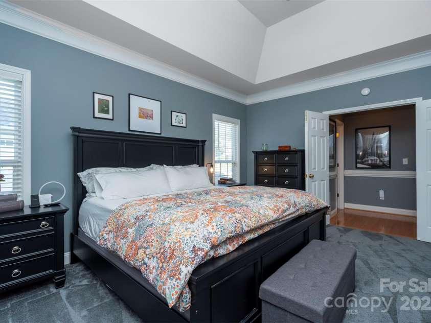 126 Doyle Farm Lane, Mooresville, NC 28115.  MLS# CAR4270254, YatesRealty ID 32228. Primary Bedroom features deep trey ceiling and new plush carpeting.