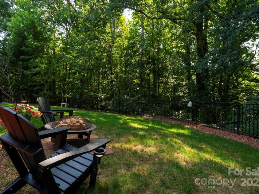 126 Doyle Farm Lane, Mooresville, NC 28115.  MLS# CAR4270254, YatesRealty ID 32228. Private Back Yard with Fire Pit.