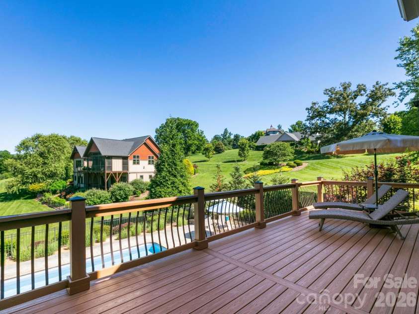 32 Lake Vista Drive, Fletcher, NC 28732.  MLS# CAR4388270, YatesRealty ID 32228. Back deck overlooking the pool