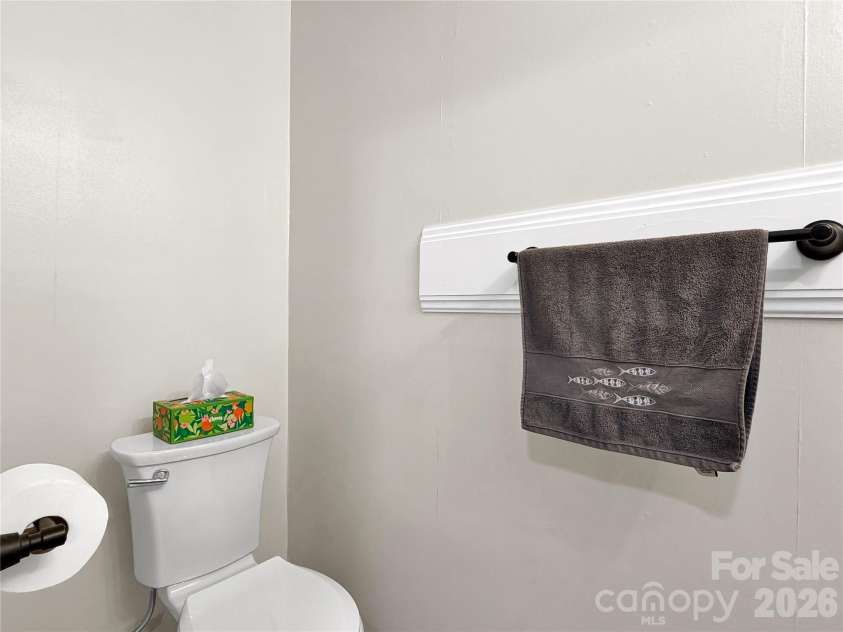 372 Shady Ridge Road, Waynesville, NC 28785.  MLS# CAR4393581, YatesRealty ID 32230. Lower level half bath
