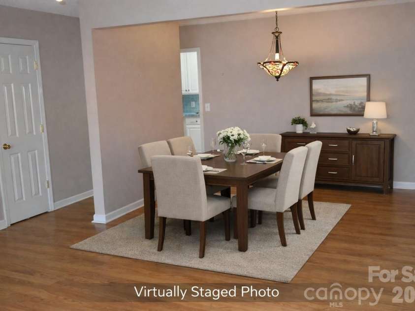 407 Broad Street, Statesville, NC 28677.  MLS# CAR4390712, YatesRealty ID 32232. Dining area virtually staged