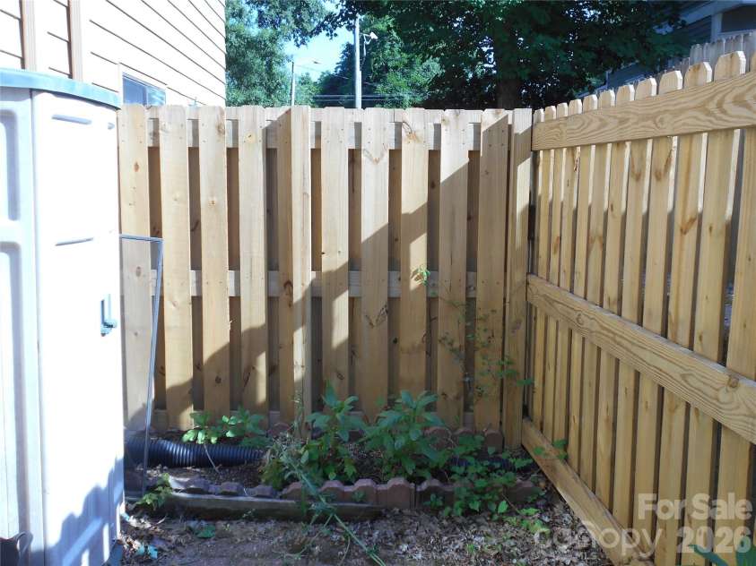 407 Broad Street, Statesville, NC 28677.  MLS# CAR4390712, YatesRealty ID 32232. Rear patio