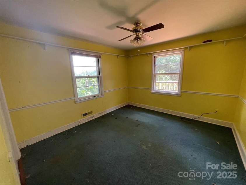 1026 Sylvan Boulevard, Hendersonville, NC 28791.  MLS# CAR4286487, YatesRealty ID 32240. Main level bedroom 2
