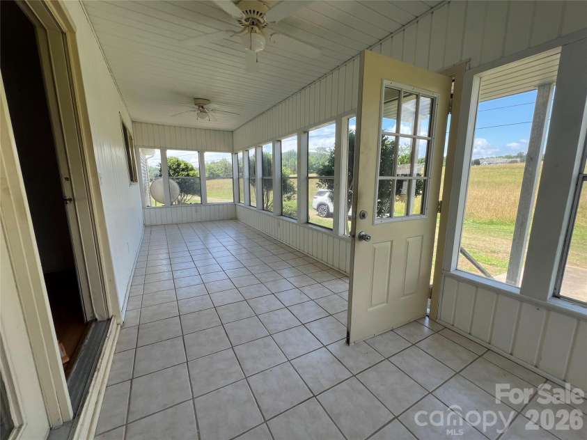 4405 Maple Creek Road, Rutherfordton, NC 28139.  MLS# CAR4390576, YatesRealty ID 32243. Enclosed porch on back of home