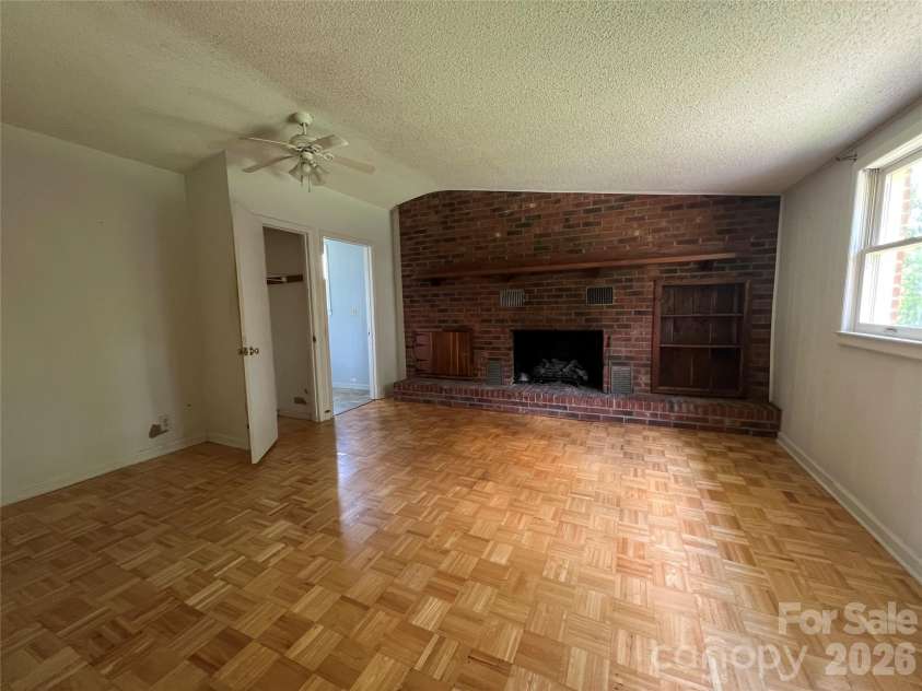 4405 Maple Creek Road, Rutherfordton, NC 28139.  MLS# CAR4390576, YatesRealty ID 32243. Master bedroom with gas log fireplace