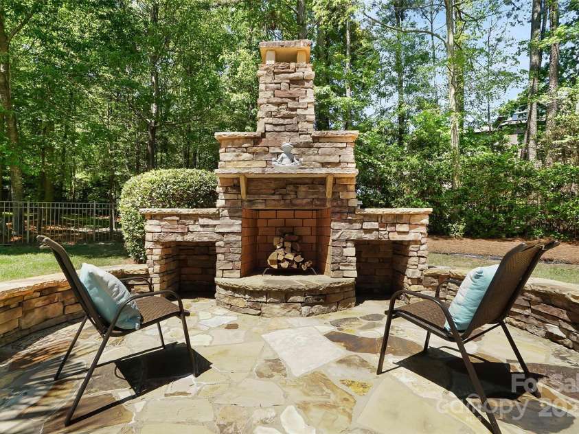 5001 Oxfordshire Road, Waxhaw, NC 28173.  MLS# CAR4243721, YatesRealty ID 32246. Outdoor Fire Place