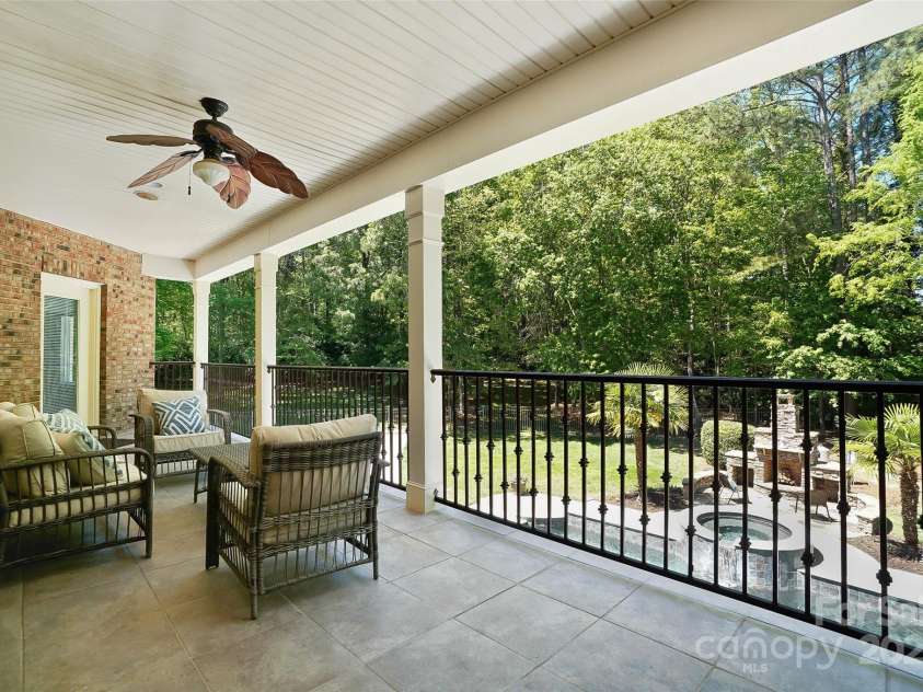 5001 Oxfordshire Road, Waxhaw, NC 28173.  MLS# CAR4243721, YatesRealty ID 32246. Upper patio overlooking pool