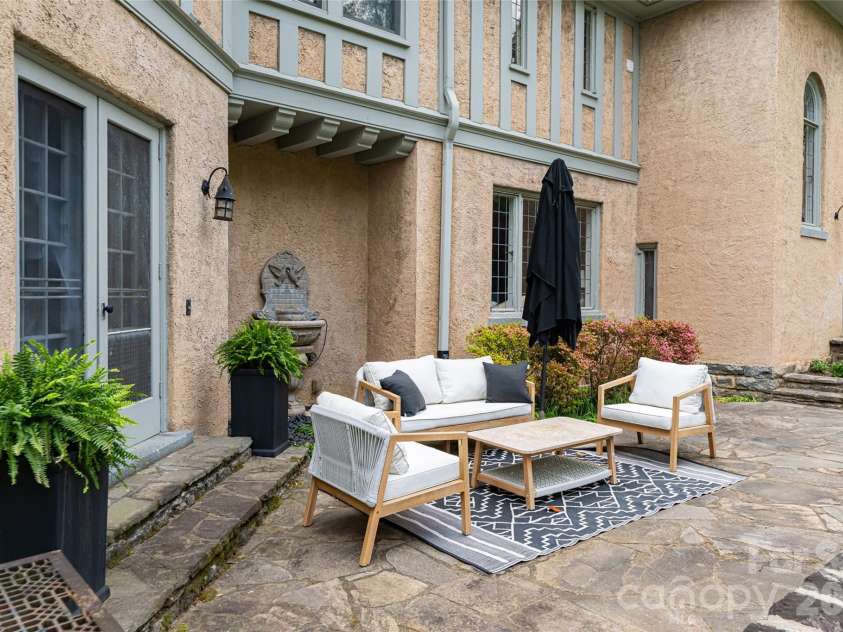 334 Vanderbilt Road, Biltmore Forest, NC 28803.  MLS# CAR4389681, YatesRealty ID 32247. Back Patio