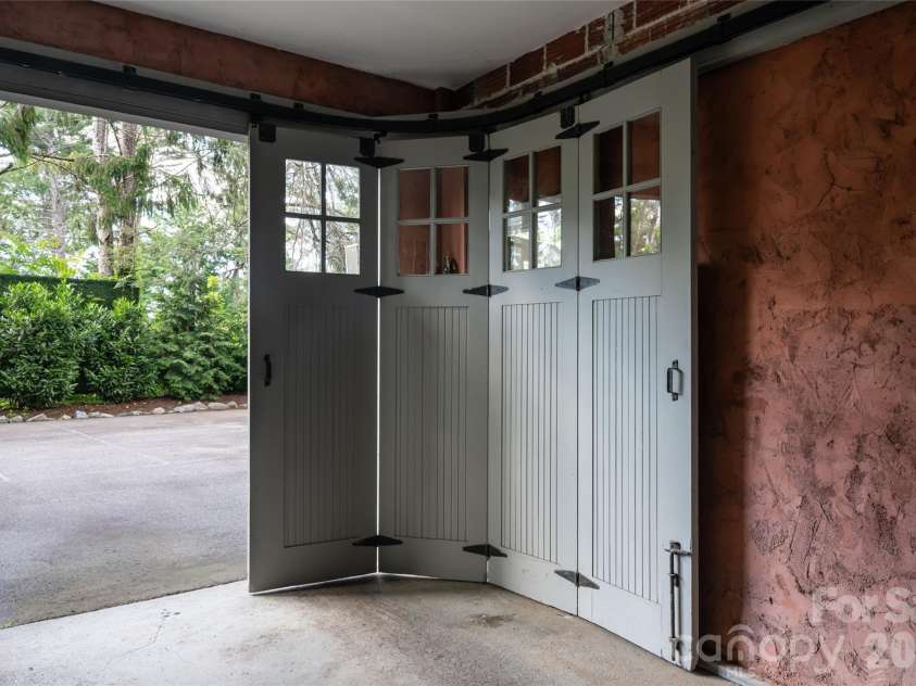 334 Vanderbilt Road, Biltmore Forest, NC 28803.  MLS# CAR4389681, YatesRealty ID 32247. Original Carriage Style Doors