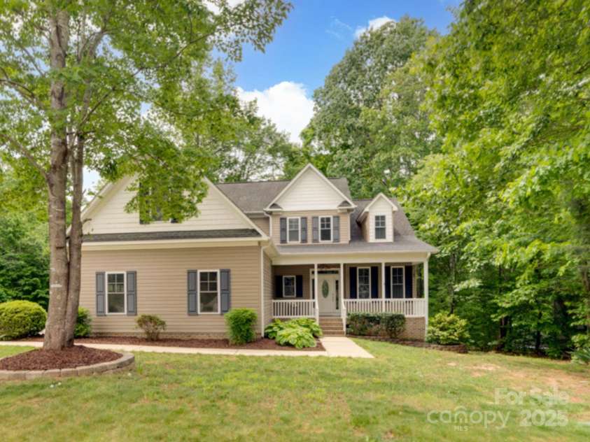 6414 Winding Creek Lane, Denver, NC 28037.  MLS# CAR4240521, YatesRealty ID 32247. Classic partial brick exterior on wooded lot in convenient Denver location
