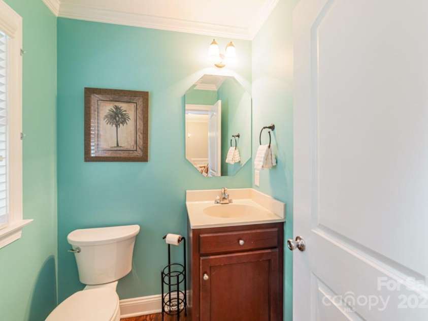 6414 Winding Creek Lane, Denver, NC 28037.  MLS# CAR4240521, YatesRealty ID 32247. Main level powder room