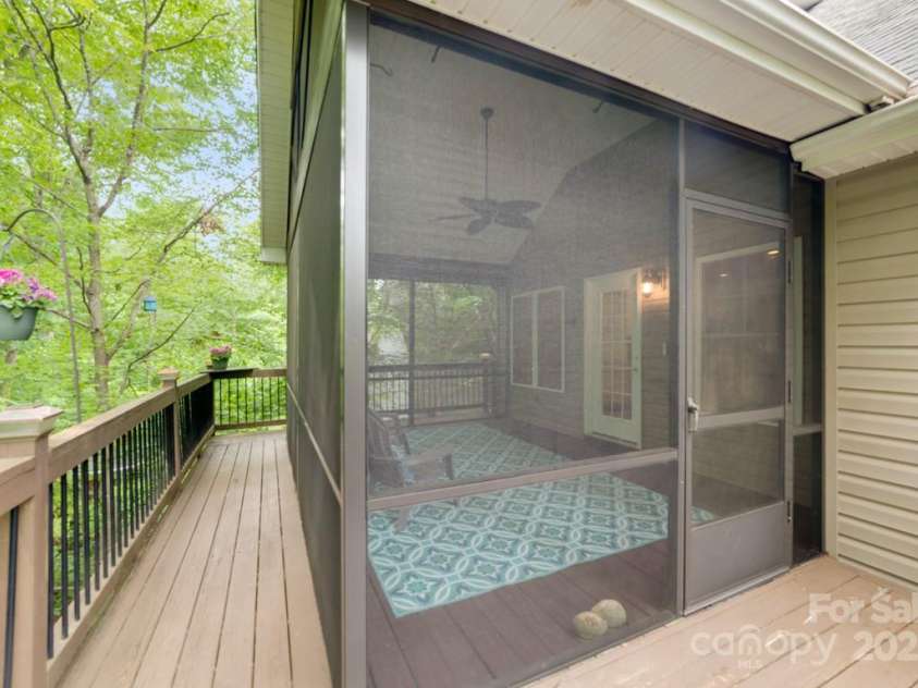 6414 Winding Creek Lane, Denver, NC 28037.  MLS# CAR4240521, YatesRealty ID 32247. Screened porch has pull down shades for temperature control