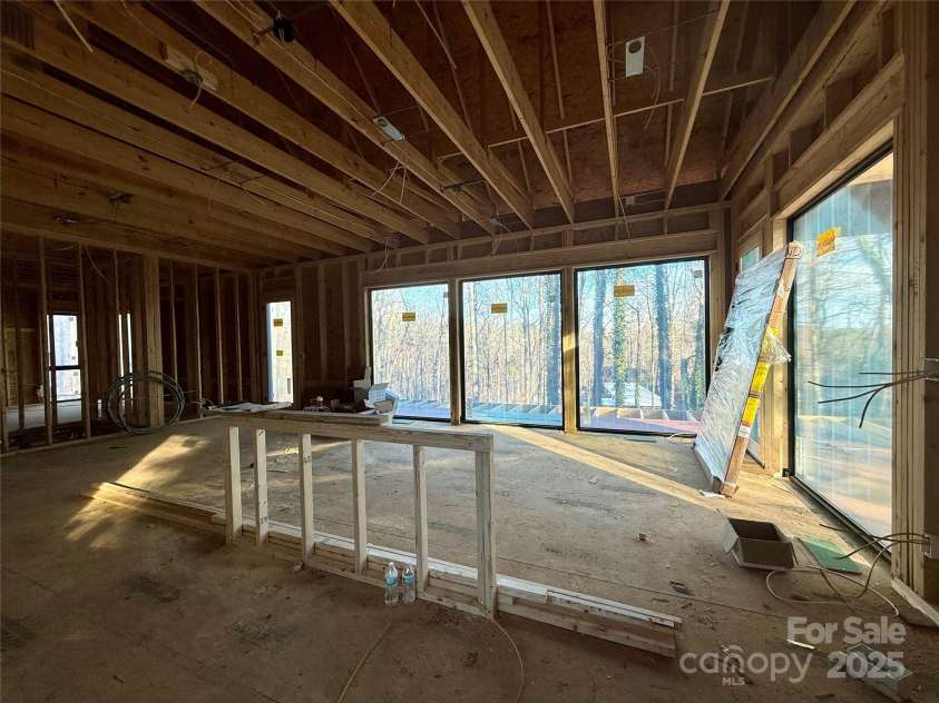 137 English Drive, Candler, NC 28715.  MLS# CAR4279070, YatesRealty ID 32249. Interior Wall of Windows