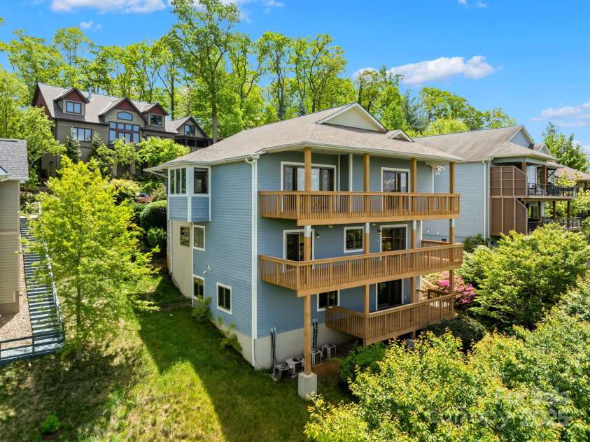 117 Distant View Drive, Asheville, NC 28803.  MLS# CAR4253814, YatesRealty ID 3225. Three levels of western facing decks- all with gorgeous views and picturesque sunsets.