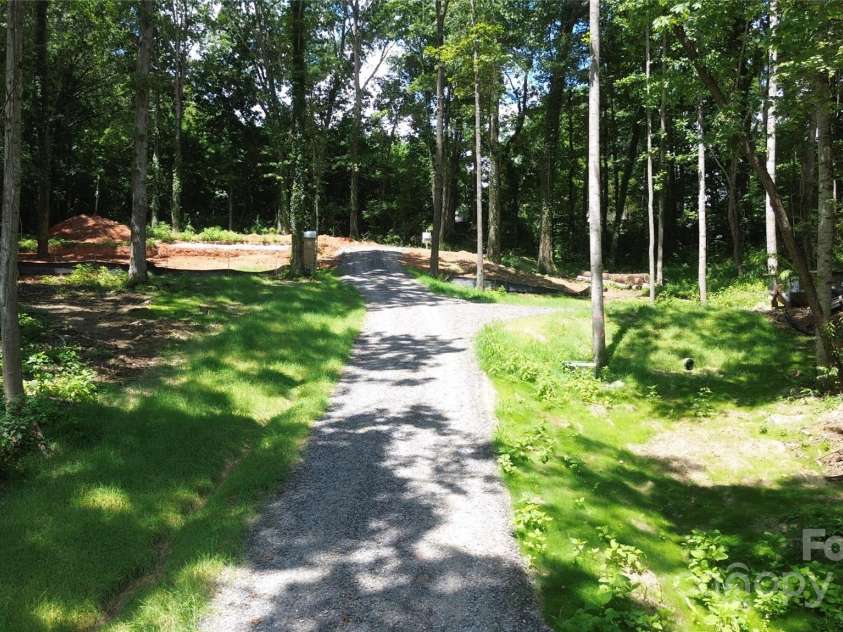 138 English Drive, Candler, NC 28715.  MLS# CAR4279075, YatesRealty ID 32250. 