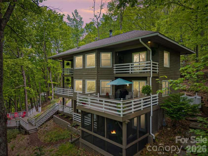 58 Sourwood Drive, Mills River, NC 28759.  MLS# CAR4390836, YatesRealty ID 32251. 58 Sourwood has an abundance of rear porches