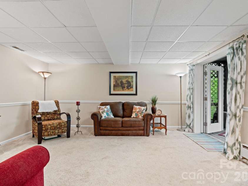 58 Sourwood Drive, Mills River, NC 28759.  MLS# CAR4390836, YatesRealty ID 32251. Lower level bonus room