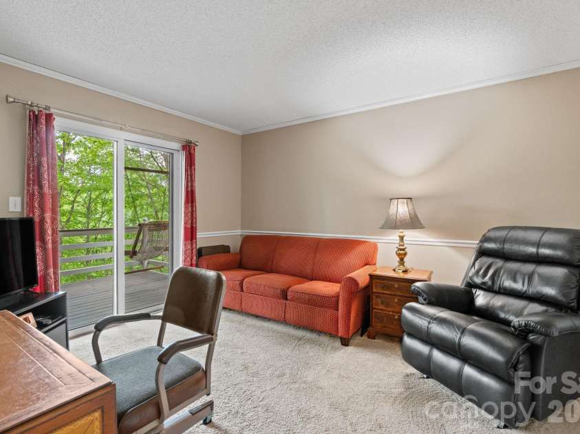 58 Sourwood Drive, Mills River, NC 28759.  MLS# CAR4390836, YatesRealty ID 32251. Main level bedroom