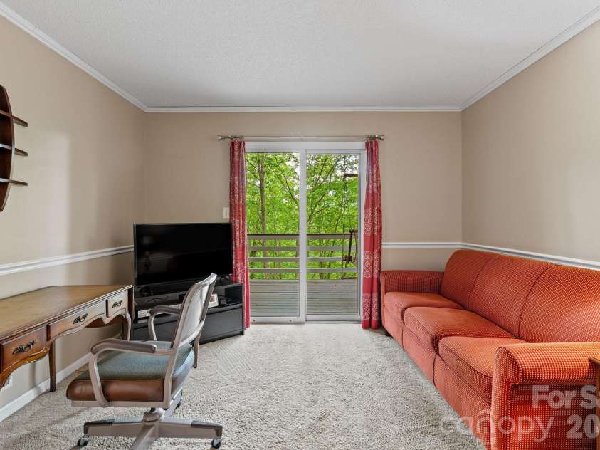 58 Sourwood Drive, Mills River, NC 28759.  MLS# CAR4390836, YatesRealty ID 32251. Main level bedroom