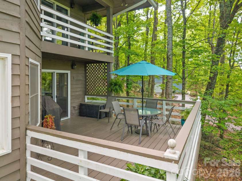 58 Sourwood Drive, Mills River, NC 28759.  MLS# CAR4390836, YatesRealty ID 32251. Rear deck off kitchen