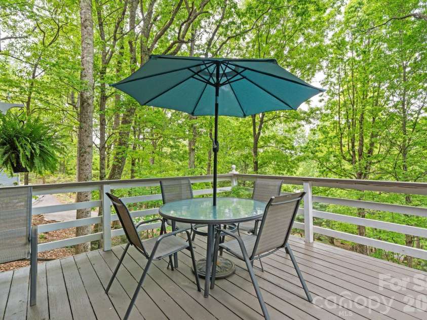 58 Sourwood Drive, Mills River, NC 28759.  MLS# CAR4390836, YatesRealty ID 32251. Rear deck off of kitchen