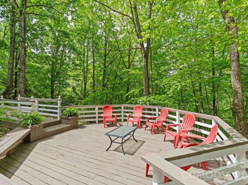 58 Sourwood Drive, Mills River, NC 28759.  MLS# CAR4390836, YatesRealty ID 32251. Sunny side deck