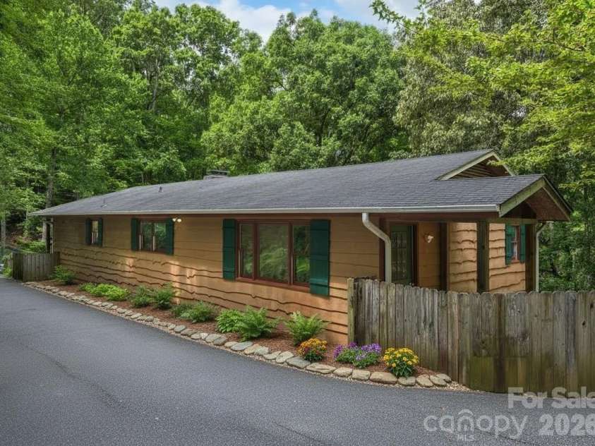 18 Wild Violet Lane, Arden, NC 28704.  MLS# CAR4284838, YatesRealty ID 32256. Virtually enhanced back elevation