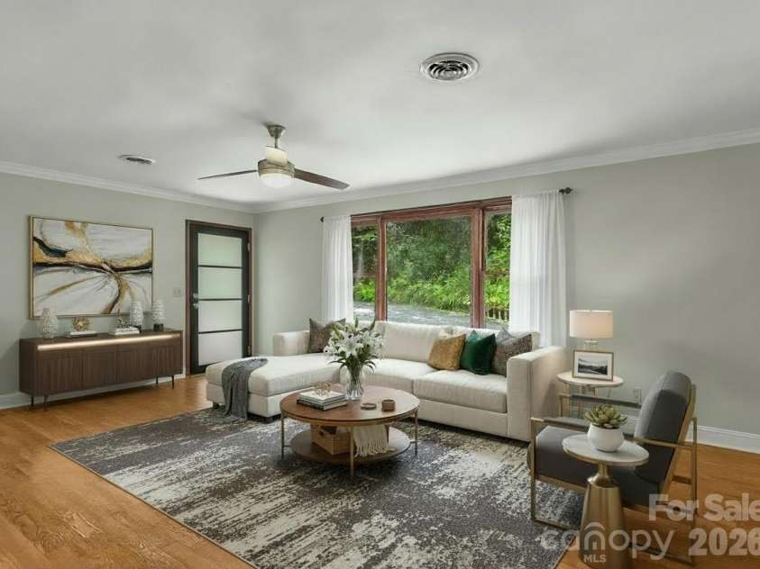 18 Wild Violet Lane, Arden, NC 28704.  MLS# CAR4284838, YatesRealty ID 32256. Virtually staged living room