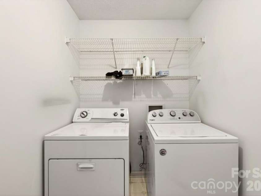 7716 Conifer Circle, Indian Trail, NC 28079.  MLS# CAR4389738, YatesRealty ID 32257. A dedicated room for laundry located in hallway leading to the garage