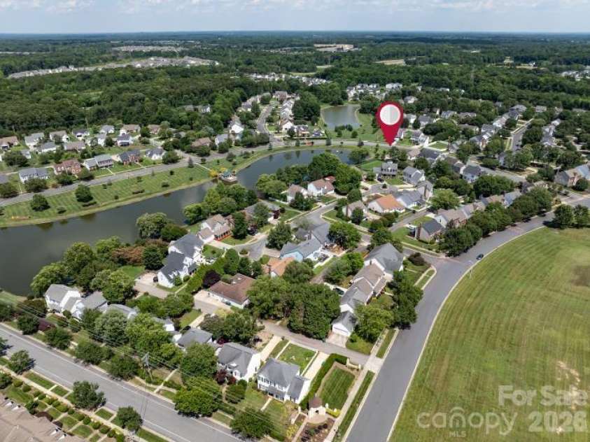 7716 Conifer Circle, Indian Trail, NC 28079.  MLS# CAR4389738, YatesRealty ID 32257. Another overhead view of lake Park