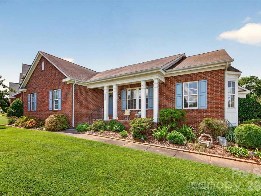 7716 Conifer Circle, Indian Trail, NC 28079.  MLS# CAR4389738, YatesRealty ID 32257. Front yard is well kept and a nice distance off Connifer Circle